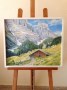 Paisaje alpino con cabaña y montañas